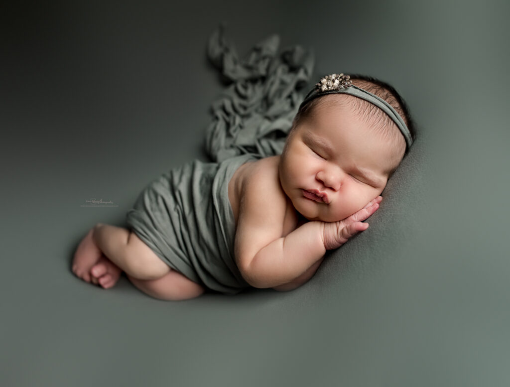 green newborn girl photoshoot