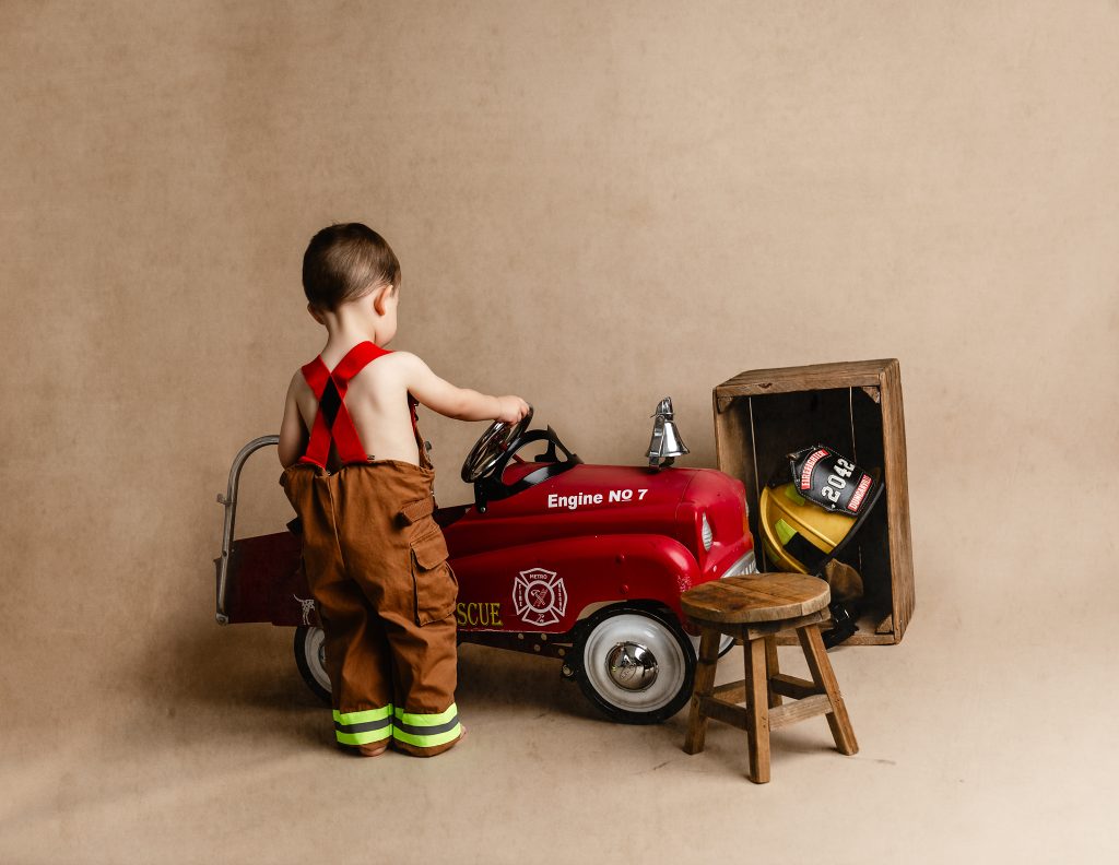 firefighter baby milestone photoshoot