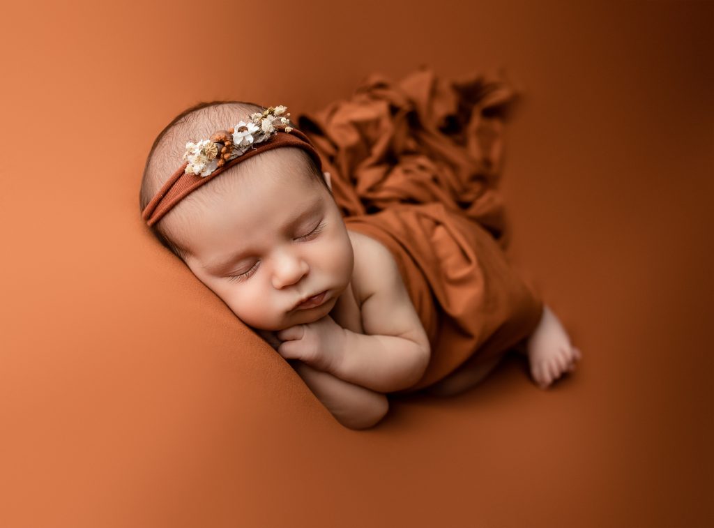 rust boho newborn photos